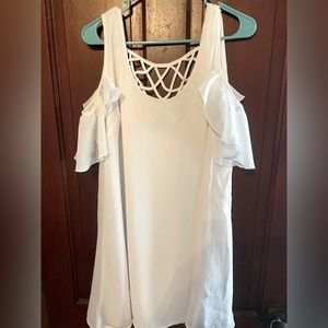White cold shoulder dress with back detail. Size large.